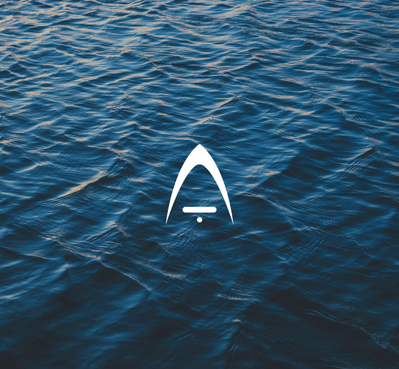 Elite harbor logo overlaying the ocean